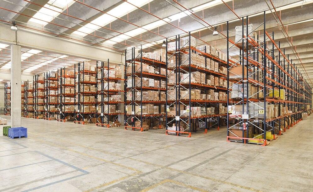 Large warehouse interior with tall shelving racks stacked with inventory
